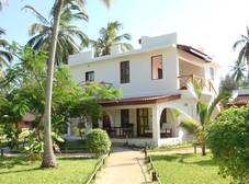 Фото отеля Flame Tree Cottages