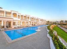 Фото отеля Invidia Coral Beach Tiran