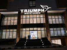 Фото отеля Triumph White Sands Hotel